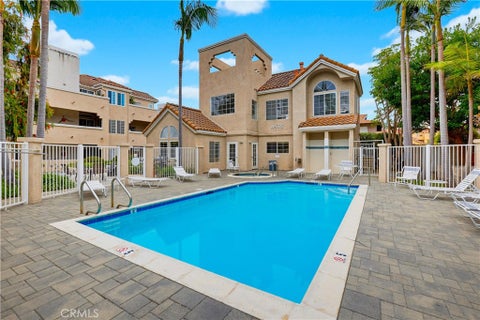 Photo of 4581 Warner AVE #302, Huntington Beach, CA 92649 (MLS # OC26149914)