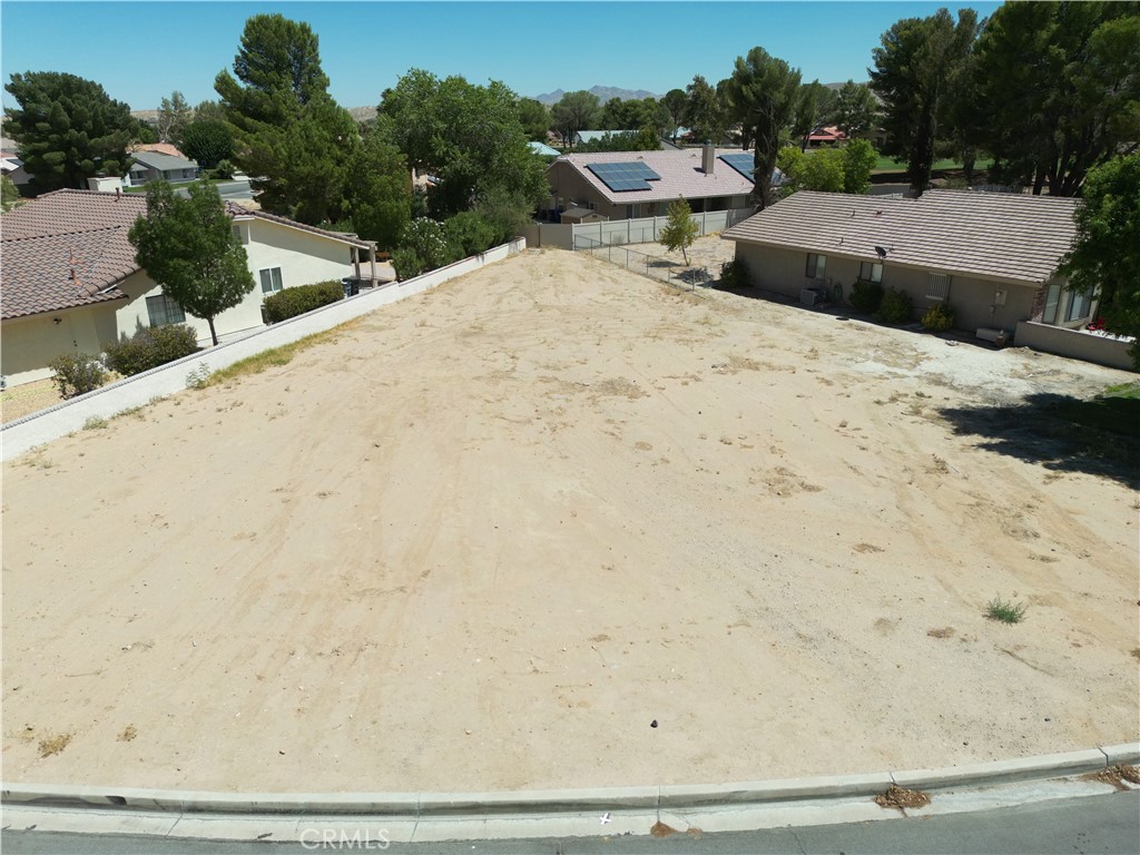 Discover your opportunity to build your dream home on this exceptional 0.21-acre lot in the prestigious Silver Lakes Community of Helendale, California. This exceptional lot comes with all utilities conveniently adjacent to the property, making construction ready and hassle-free. The strategic positioning next to the golf course ensures privacy, scenic views, and the peaceful ambiance that makes Silver Lakes community so desirable. This is more than just a potential dream-home building lot – it's your gateway to a lifestyle where every day feels like a vacation. With golf course access, a list of great amenities including lake and gym access, as well as, a well-established community with great restaurants, this property represents both an exceptional place to call home and a solid real estate investment in one of the High Desert's most sought-after communities. Hurry before this one is gone.