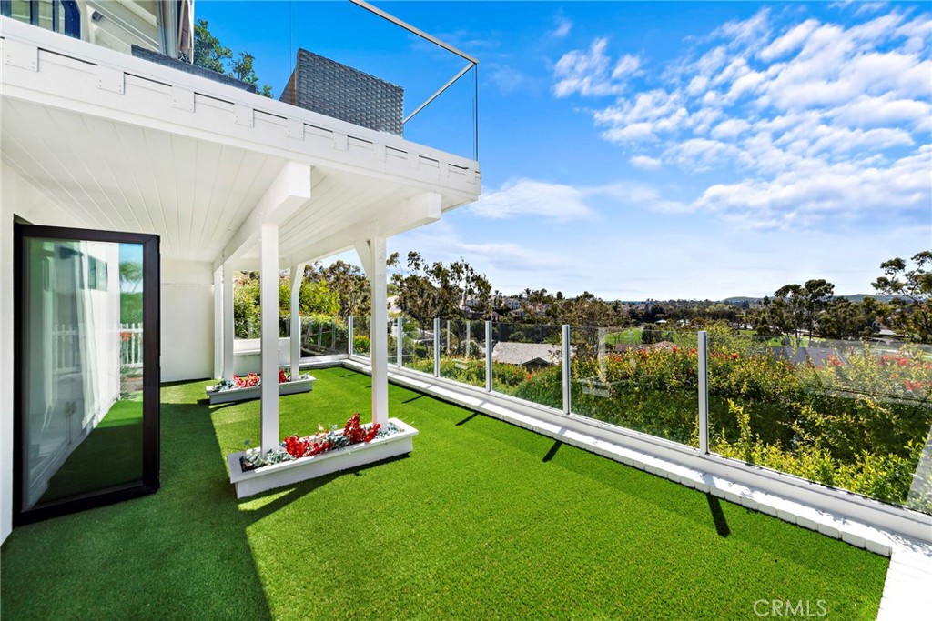 Welcome to 17 Monaco, a beautifully remodeled residence nestled in the exclusive Harbor Ridge community of Newport Beach. This sophisticated coastal retreat offers stunning panoramic views of Catalina Island, the ocean, and twinkling city lights — a rare blend of luxury, comfort, and design.
Spanning approximately 3,501 square feet, the thoughtfully reimagined interior showcases a harmonious blend of modern elegance and timeless style. Expansive windows fill the open-concept living spaces with natural light, framing picturesque vistas from nearly every room.
The chef-caliber kitchen is a showstopper — outfitted with top-of-the-line appliances, custom cabinetry, a generous center island, and sleek quartz countertops. Whether entertaining or enjoying a quiet evening in, the adjacent dining area provides the perfect setting, enhanced by ocean and city light views.
The private primary suite is a serene escape, complete with a spacious patio to take in the coastal scenery. The spa-inspired en-suite bathroom features a soaking tub, dual vanities, and a large walk-in shower with a wall of glass overlooking the tranquil landscape.
Two additional bedrooms and bathrooms provide comfort and privacy for guests or family, while a versatile den offers the flexibility to serve as a home office, formal dining space, or entertainment room.
Residents of Harbor Ridge enjoy access to exclusive amenities, including 24-hour gated security, four pools, three tennis courts, and beautifully maintained grounds. Ideally located just minutes from Fashion Island Mall, world-class beaches, renowned dining, luxury shopping, and the iconic Pelican Hill Resort & Golf Club.
Don’t miss this rare opportunity to own a stunning coastal sanctuary in one of Newport Beach’s most desirable communities. Schedule your private tour today.