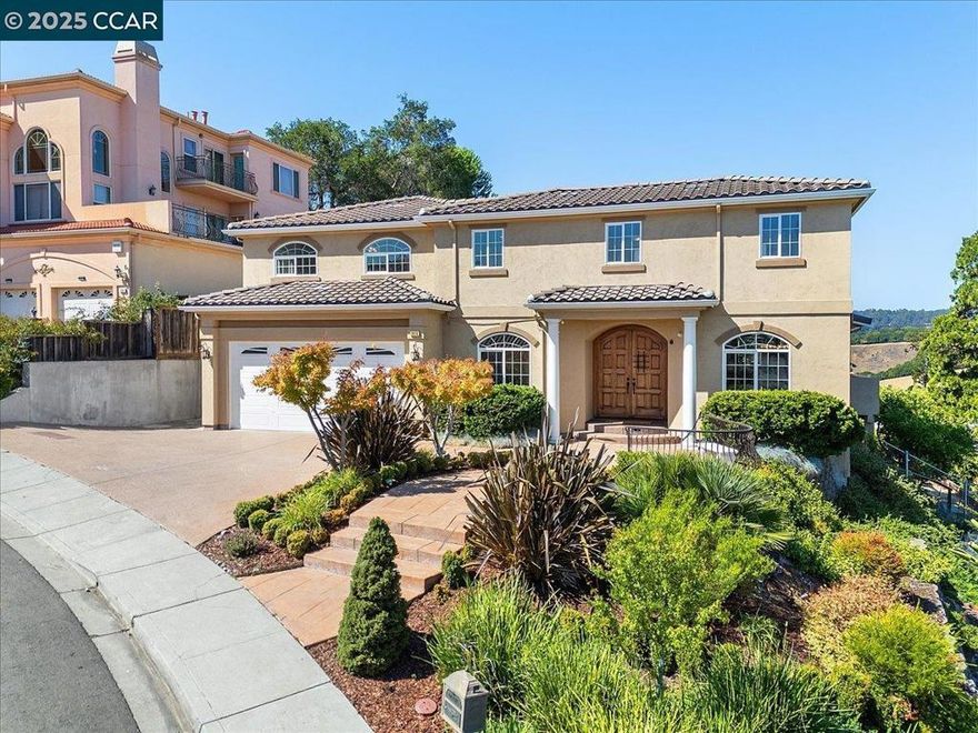 NEW PRICE!!! Luxury Living w/Sweeping Panoramic Views & Multigenerational Comfort in Exclusive Gated Community. Experience elevated living in this stunning 5-bed, 4-bath custom-built home, showcasing panoramic views from one of Castro Valley’s most prestigious gated enclaves. Perched on a hilltop among 11 custom residences, this home offers 5,200 sq. ft. of thoughtfully designed space—blending functionality, craftsmanship & scenic beauty. Gorgeous double door opens to foyer flooded w/natural light. A private elevator connects both levels for seamless access. Upstairs you will find a large primary w/spa-like bathroom & fireplace. Secondary en-suite plus 2 additional rooms, full hall bathroom & laundry. Downstairs, you will find a dedicated home office w/full bath, adding flexibility as a 5th bedroom, ideal for multi-gen living or extended guests. Gourmet kitchen feats. top-tier appliances, island & ample counter space—perfect for meal prep & festive gatherings. The spacious lower level offers opp. for a 3rd living space, bar area or playroom. Outside, enjoy mature citrus trees & a peaceful backyard w/turf framed by breathtaking hilltop vistas. Oversized tandem three-car garage w/extra-deep storage. Top-rated schools, markets, & major commuter route (I-580). Open Sun 10/12 1:30-4