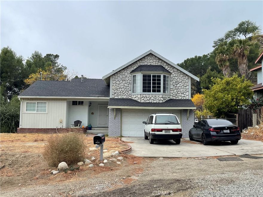 Beautiful 4 bed 2 bath two story totally remodeled house sitting on almost half an acre land. A very desirable area in Tujunga, Designated RV parking area.  Ample improvement possibility. Buyer and buyers agent should do their own due diligence!