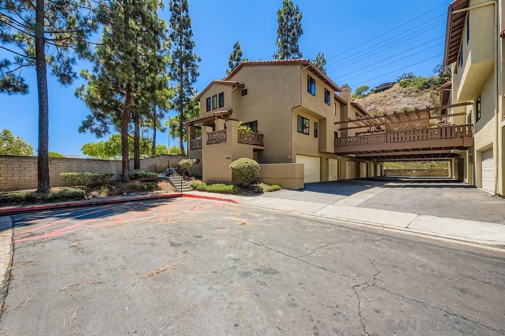 Beautiful tri level townhome nestled in a quiet neighborhood with close proximity to the major shopping malls, freeways & restaurants. New custom paint, new carpet & pad. Spacious living room & dining room w/hardwood floor, cozy fireplace & recessed lighting. Remodeled bathrooms & kitchen w/SS appliances including a new dishwasher & granite counter tops. Attached 2 car garage w/extra bonus room/work out room/storage room. Large private patio/deck off living room for your outdoor entertainment. Great Complex. Lovely living room with hardwood floor, recessed lighting and cozy fireplace. access to a huge deck/patio from the dining room and kitchen. Remodeled kitchen and bathrooms with granite counter tops. Fresh paint, new carpet and pad, lovely location private and with open space view. Great community pool and spa fully fenced with dog park located on site. Tons of guest parking, new dishwasher and stainless appliances. A must see.