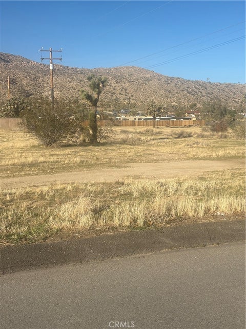 Photo of 56440 Sunland Dr, Yucca Valley, CA 92284 (MLS # JT26233193)