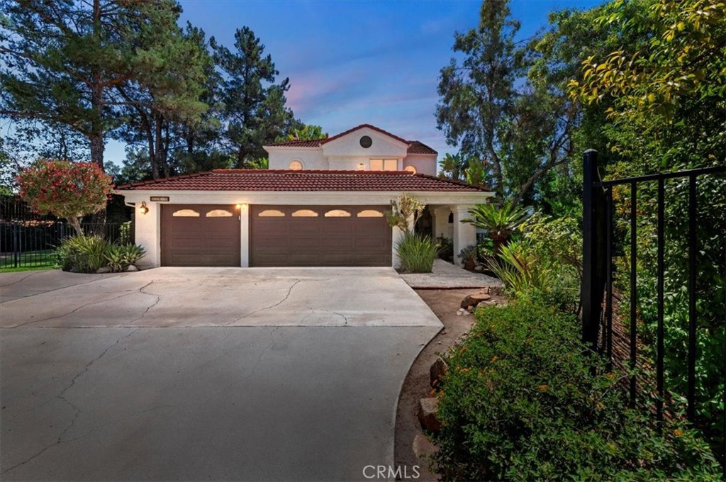 Tucked away at the end of a long private driveway, this stunning north Moreno Valley home offers rare privacy and a resort-style backyard you’ll love coming home to. Set back from the street behind mature landscaping, this property combines seclusion with style.
Inside, the upgraded kitchen features rich cherry wood cabinetry, while the remodeled primary bath provides a relaxing retreat. A new upstairs tub and shower plus an updated balcony add fresh touches throughout.
The backyard is truly an entertainer’s dream—featuring large covered patios, all-new redwood and vinyl fencing, and a sparkling pool with a new pump and filter. A matching shed offers extra storage, while the layout provides plenty of room for gatherings or quiet evenings outdoors.
From the inviting front entry to the private setting and thoughtful upgrades, this home is the perfect blend of comfort, function, and charm. Don’t miss the opportunity to make this secluded gem yours!