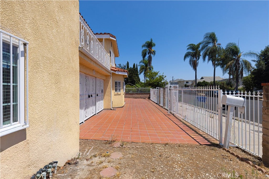 Photo of 3672 S Normandie AVE, Los Angeles, CA 90007 (MLS # TR26177121)