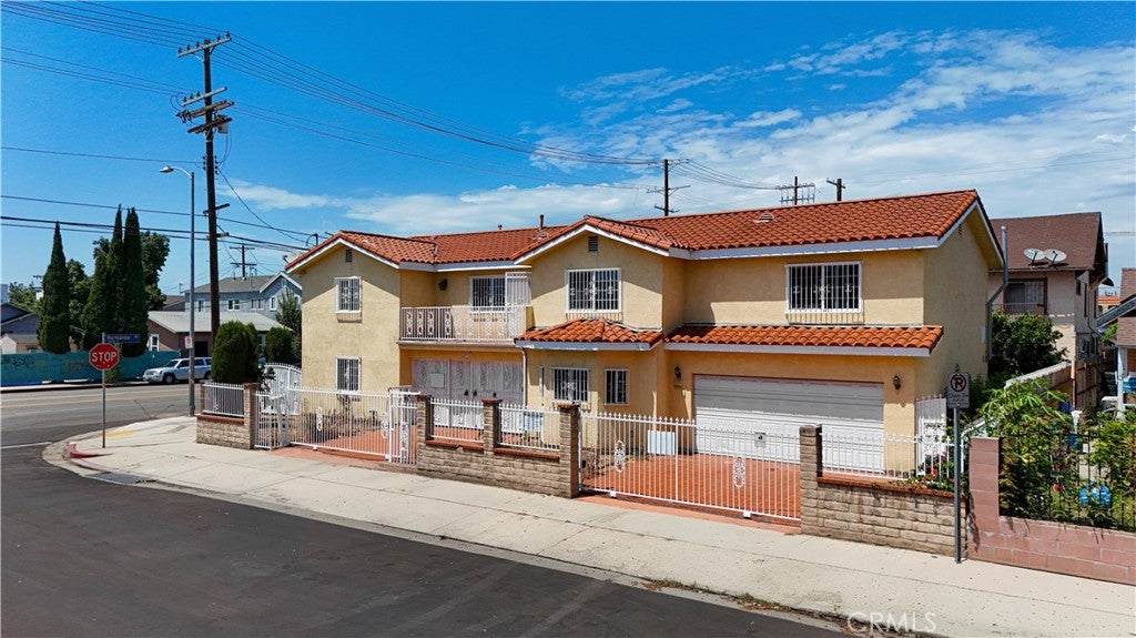 Photo of 3672 S Normandie AVE, Los Angeles, CA 90007 (MLS # TR26177121)