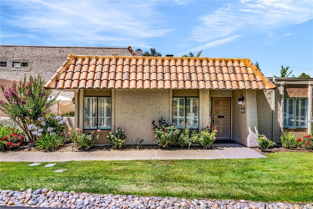 Welcome to this uniquely located single-level home in the coveted, gated community of Rinconada Hills. Nestled among 107 acres of serene, natural landscape, this peaceful retreat offers winding walking paths, scenic ponds, and a large statement lake. This rare South-facing Villa De Anza model enjoys incredible morning sun with a prime interior corner location within the community, tucked away at the end of a quiet cul-de-sac. The floor plan features three bedrooms and two bathrooms, spanning over 1,440 square feet of well-designed living space with stunning, uninterrupted views of the well-maintained community grounds and a private pond. As you enter the home, you are greeted with vaulted ceilings throughout the living room, a cozy fireplace, and windows that fill the home with natural light, all outfitted with wood plantation shutters. Through dual sliders, you can access your private garden patio surrounded by mature rose bushes to enjoy time outside with remarkable community views. The flexible layout allows for either three distinct bedrooms or an easy reconfiguration to create a spacious primary suite. Down the hall is a full guest bathroom and a separate laundry/utility room. The home features a spacious 2-car garage with ample storage, central heat and air conditioning, and skylights to provide even more sunlight. Residents of Rinconada Hills enjoy A 24/7 attendant at the main gate, access to highly rated Campbell schools, and a peaceful lifestyle close to nature, with all the conveniences of the South Bay. Do not miss this opportunity to secure a rare single-level end unit with one of the best locations the community has to offer. Make this prime Rinconada Hills residence yours for years to come!