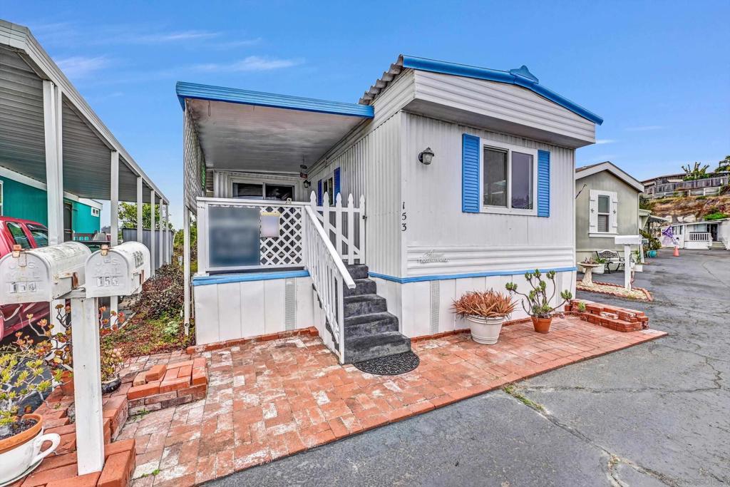 Welcome to 153 Sherri Ln—a hidden gem in the heart of Oceanside, just minutes from the beach! This beautifully maintained 2-bed, 2-bath home includes a bonus room perfect for guests, an office, or creative space. Enjoy an open layout with updated vinyl and laminate flooring, new windows with stylish shutters, and a fully equipped kitchen and laundry area. Unwind on the inviting front porch or host in the oversized backyard—an uncommon perk in this friendly coastal community! Located within walking distance to the beach and offering low space rent, this home combines comfort, convenience, and an unbeatable coastal location. Don’t miss this opportunity!