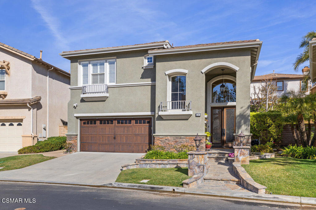 Discover this stunning, remodeled gem nestled within the gated community of Cobblestone. The home welcomes you with custom glass and wrought iron entry doors leading into a bright, airy living and dining area filled with natural light. The kitchen, equipped with upgraded appliances and a spacious island, seamlessly connects to the family room, creating a perfect gathering space. Enjoy cozy evenings by the gas log fireplace or enjoy a cinematic experience with the drop-down screen and projector. Throughout the home, elegant hardwood and stone tile flooring add a touch of sophistication. The expanded laundry room offers ample storage, with built-in wine storage and a refrigerator. The main level features a convenient powder room, while you'll find two full bathrooms, three bedrooms, and an office upstairs. The master suite boasts a walk-in closet and a sliding-door closet for extra storage. Custom shutters adorn the windows, except for the upper windows in the living/dining area, enhancing privacy and style. The home is equipped with a tankless water heater ensuring endless hot water and a Bosch air conditioning and heating system for year-round comfort. The beautifully landscaped and hardscaped front and backyards provide serene outdoor spaces. The two-car garage is thoughtfully designed with wall-to-wall storage cabinets and ceiling storage, ensuring plenty of room for all your needs. This home perfectly blends luxury and functionality, offering an exceptional living experience.