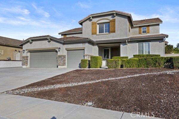 Welcome to this highly sought-after “Home Within a Home,” offering the perfect blend of luxury, functionality, and versatility. Designed with today’s modern lifestyles in mind, this home features a private NextGen® suite—an exceptional layout ideal for extended family, long-term guests, or rental potential.
The NextGen® suite includes over 950 ft. of completely private living space with its own separate entrance and exit, a spacious bedroom with retreat and walk-in closet, full bathroom, kitchenette, private laundry area, and a dedicated living room—all self-contained and thoughtfully designed for comfort and independence.
Step into the main residence and be welcomed by gorgeous custom tile flooring and a bright, open-concept floor plan. The home offers six bedrooms and four bathrooms, a large upstairs loft, indoor laundry, and a three-car garage. The chef’s kitchen is a standout, featuring stainless steel appliances, double ovens, a walk-in pantry, recessed lighting, granite countertops, and a generous center island that flows seamlessly into the great room with a cozy fireplace and dining nook.
Upstairs, the secondary bedrooms are spacious and well-appointed, sharing a full bathroom with dual sinks, a tub/shower combo. Another bedroom offers an en-suite shower in bathroom perfect for teens, guests, or a live-in nanny. The primary suite is a luxurious retreat with a generous walk-in closet, dual vanities, soaking tub, separate shower, and a private walk-in closet.
This rare and flexible floorplan truly offers two homes under one roof—providing the space, comfort, and options you’ve been searching for.