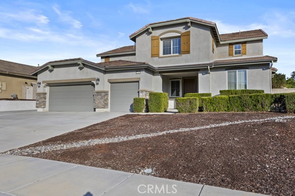Welcome to this highly sought-after “Home Within a Home,” offering the perfect blend of luxury, functionality, and versatility. Designed with today’s modern lifestyles in mind, this home features a private NextGen® suite—an exceptional layout ideal for extended family, long-term guests, or rental potential.
The NextGen® suite includes over 550 sq. ft. of completely private living space with its own separate entrance and exit, a spacious bedroom with retreat and walk-in closet, full bathroom, kitchenette, private laundry area, and a dedicated living room—all self-contained and thoughtfully designed for comfort and independence.
Step into the main residence and be welcomed by gorgeous custom tile flooring and a bright, open-concept floor plan. The home offers six bedrooms and four bathrooms, a large upstairs loft, indoor laundry, and a three-car garage. The chef’s kitchen is a standout, featuring stainless steel appliances, double ovens, a walk-in pantry, recessed lighting, granite countertops, and a generous center island that flows seamlessly into the great room with a cozy fireplace and dining nook.
Upstairs, the secondary bedrooms are spacious and well-appointed, sharing a full bathroom with dual sinks, a tub/shower combo. Another bedroom offers an en-suite shower in bathroom perfect for teens, guests, or a live-in nanny. The primary suite is a luxurious retreat with a generous walk-in closet, dual vanities, soaking tub, separate shower, and a private walk-in closet.
This rare and flexible floorplan truly offers two homes under one roof—providing the space, comfort, and options you’ve been searching for.