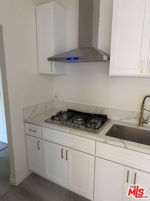 Photo of 1201 E 20th Street #1203, Los Angeles, CA 90011 (MLS # 26999575)