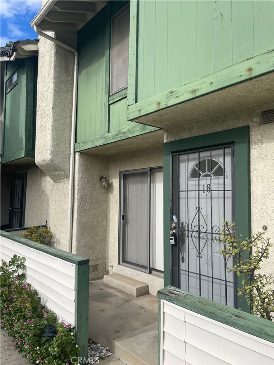 Move in condition tri-level townhome has 3 bedrooms, 3 baths, and over 1,356 sqft of thoughtfully designed living space, complete with an attached two-car garage. The main floor welcomes you with a spacious living room with a brick-style fireplace, guest bathroom, and ample storage. The kitchen is located with a large dining area perfect for entertaining. Located upstairs is the primary bedroom with high ceilings private bathroom.  The additional bedrooms share a hallway bathroom are all located upstairs keeping the family close together. Additional highlights include new paint throughout and new carpet in bedrooms low HOA fees, ample guest parking, and easy access to the community pool and spa. The complex is ideally located near major freeways, CSUN, shopping, dining, and entertainment options. Experience the perfect blend of convenience and comfort in this North Hills gem!