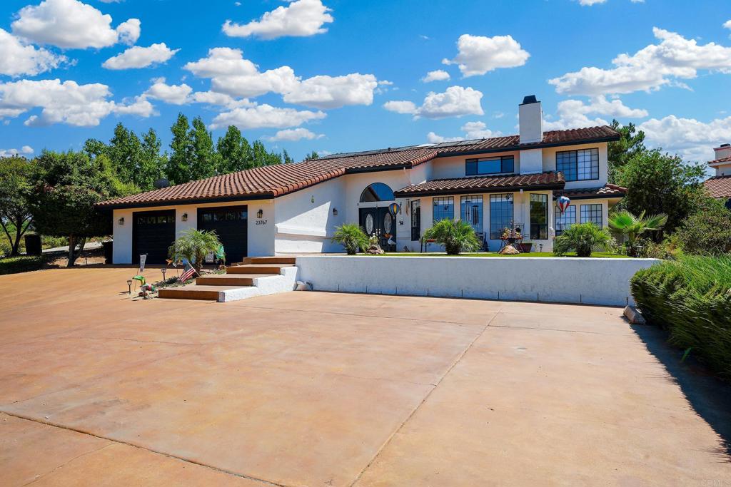 Private poolside resort living on one of San Diego Country Estates most desirable streets! Light, bright and airy, this quiet and spacious residence is completely move-in ready. Relax by the sparkling pool, gather around the firepit, BBQ and watch the 86" TV in the shade of the cabana. Practice your putting & cornhole skills! Home has a NET ZERO electric bill with paid solar. Open upgraded kitchen has double oven and giant walk-in pantry. Garage has tons of storage plus stairs that lead to a storage loft. Room for cars and a golf cart (you can drive anywhere in the Estates in it!) Downstairs bedroom had a closet added, making it a true bedroom. Luxurious upstairs primary suite with jacuzzi tub, bonus adjoining room, room-sized walk-in closet, plus 2 more bedrooms. Current owner added more solar panels, 2nd AC unit for split-level cooling/heating, new 6-ft vinyl privacy fence, retaining walls, colored concrete, artificial turf, gutters, reverse osmosis system, window treatments and much more. Located in beautiful San Diego Country Estates, this home is near a world-class golf course (Listed in the US Top 100 under $100) with amazing monthly fees for unlimited golf (only $317 for a family of 2 adults plus children). Enjoy views from the HOA-owned restaurant and Par Lounge, offering entertainment and drink specials. Included amenities for HOA members are no-fee tennis & pickleball courts, 2 pools, parks, playgrounds, dog park, basketball court, summer Concerts in the Park and great community events. Horse lovers enjoy 2 equestrian centers, horse boarding, RV parking, numerous horse & hiking trails. Great schools & rec center programs. So many amenities for $175/month. Must see!