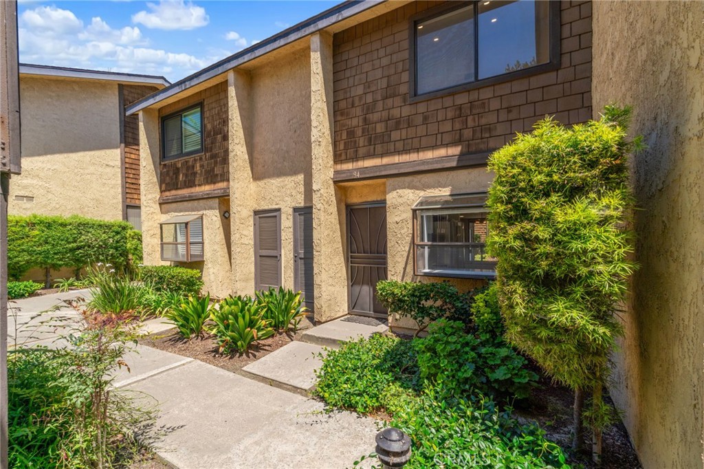 Step into the effortless cozy home nestled in the idyllic Lakewood Shores gated community. Spanning over 1,050?sq?ft, this two-bedroom, one-bath condo features a light-filled open layout with vaulted ceilings, modern finishes throughout, and a kitchen complete with stainless appliances and recessed lighting.
Step outside to your private patio, where you'll enjoy peaceful views of landscaped pathways, streams, and ponds. Community amenities deliver a resort-style lifestyle with two pools, hot tubs, sauna, and tennis courts. Convenient interior features include ceiling fans, built-ins, and upper-level bedrooms for privacy and comfort.
A fantastic value and centrally located in an ideal school district, and minutes from shopping, dining, and easy freeway access. HOA includes landscaping and access to all amenities, making this one a turnkey opportunity!