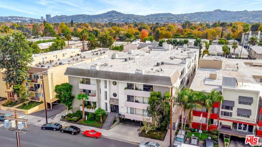 Photo of 11910 Weddington Street #306, Valley Village, CA 91607 (MLS # 25608409)