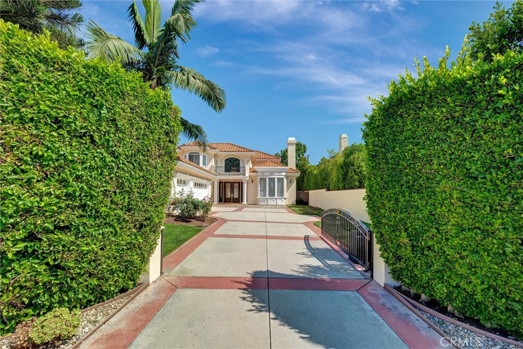 MAGNIFICENT MEDITERRANEAN HOME! CUSTOM BUILT IN 2002 WITH HIGH QUALITY & DETAIL DESIGN MARBLE FLOOR, CROWN MOLDING, HIGH CEILING, FOYER ENTRY, SPIRAL STAIRCASE, GRAND CHANDELIERS. 6 BR/ 5.5 BA, 4 SUITES, 2 JACK & JILL ROOMS. MASTER BATH WITH JACUZZI TUB, STEAM SHOWER. KITCHEN WITH GRANITE COUNTERTOPS, CENTER ISLAND. SEPERATE WORK KITCHEN. 2 ZONE CENTRAL A/C, SECURITY SYSTEM. LAUNDRY ROOM WITH CABINET & SINK. BEST SCHOOL IN BALDWIN STOCKER AREA! FACING SOUTH, GOOD FENG-SHUI. CONVENIENT LOCATION FOR SHOPPING, BANKING, HOSPITAL, ENTERTAINING.
