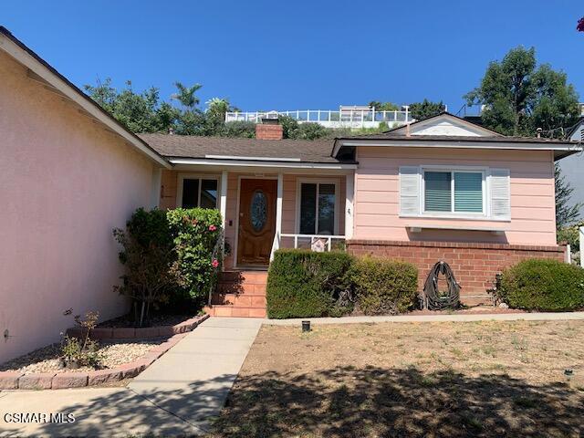First time on the market in over 60 years! This 2 bedroom, 2 bath Sun Valley home offers incredible potential for first-time buyers, investors, or anyone ready to create their dream space. The interior features extra-large windows that fill the home with natural light, wood flooring in the den and living room, a cozy fireplace, and the convenience of indoor laundry.One of the most captivating features of this property is the expansive hilltop terrace patio. From here, you'll enjoy breathtaking city views in a peaceful, private setting -- an ideal spot to unwind, entertain, or host memorable gatherings. The patio is thoughtfully designed with a beautiful water feature, ambient lighting, and storage, making it as functional as it is picturesque.Don't miss this rare opportunity to reimagine a home with great bones, character, and views!