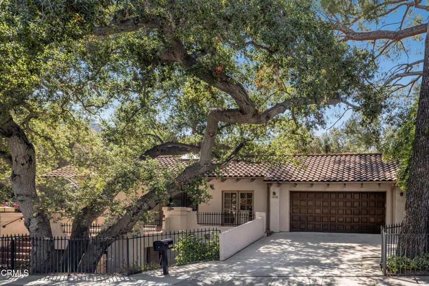 Surrounded by beautiful, mature trees that create a tranquil, park-like setting, this 3,224 sq ft residence in the sought-after Linda Vista area of Pasadena offers the perfect balance of privacy, convenience, and timeless style. Designed as a reverse-story home, all bedrooms are thoughtfully positioned on the lower level, creating an ideal separation between entertaining and private living spaces. The main floor welcomes you with a dramatic entryway highlighted by soaring cathedral ceilings that flow into a sunlit living room. A spacious dining room with tall ceilings sets the stage for elegant gatherings, while the well-appointed kitchen features a central island and opens to an outdoor sitting area ideal for al fresco dining. A cozy family room extends the living space with access to multiple patios, blending indoor comfort with outdoor enjoyment. On the lower level, the expansive primary suite serves as a private retreat, complete with a fireplace, a generous bathroom, and a large walk-in closet. Three additional bedrooms provide flexibility--one with its own en-suite bath, and two more sharing a full bath. A dedicated laundry area completes this floor. Additional highlights include a large garage and a substantial storage area, ensuring both functionality and convenience. Located in West Pasadena, the home enjoys close proximity to the Rose Bowl, Kidspace Museum, Old Town Pasadena, Eagle Rock, Highland Park, and Downtown LA--making it an exceptional retreat with easy access to some of Southern California's most vibrant destinations.
