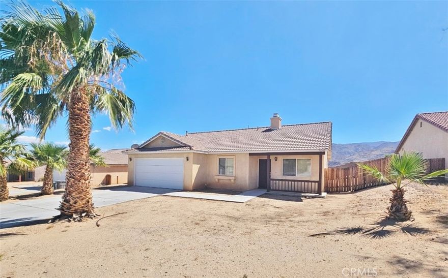 YOUR new home awaits~~!  3 bedrooms, 2 bathrooms located in one of 29 Palms' nicest neighborhoods - Desert Vista!!  Spacious Living and Dining Room off the entry, Family Room with FIREPLACE, and kitchen.  Kitchen has GRANITE COUNTERS, TILE FLOORING, and STAINLESS STEEL (mostly) APPLIANCES.  :-)  Kitchen includes access to the private backyard.  Down the hall from the Kitchen you'll find a Full Bathroom with Tub/Shower Combo, two Secondary Bedrooms, and the Laundry Room with WASHER & DRYER INCLUDED WITHOUT WARRANTY.  At the end of the hall is the Primary Suite with plenty of room for a king-sized bed, TWO WALK-IN CLOSETS, and Primary Bathroom with Tub/Shower Combo!  PRIVATE BACKYARD ACCESS FROM THE PRIMARY SUITE!!  Backyard includes Covered Patio, room for gatherings, a VIEW OF JOSHUA TREE NATIONAL PARK, and NO NEIGHBORS BEHIND!  2-CAR GARAGE.  Rent includes kitchen appliances plus washer/dryer without warranty.  Tenants pay for utilities and other services.  No smoking anywhere on the premises.  Pets / animals will be considered on a case-by-case basis.  MAKE THIS YOUR HOME TODAY!!!