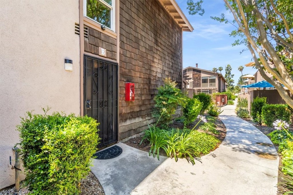 Welcome to 1084 Cabrillo Park Unit B, a move-in ready end-unit condo offering over 825 sq. ft. of comfortable living with no neighbors above or below. Located in the highly sought-after Redwoods Community on the Tustin border, this home features a spacious open floor plan with fresh paint, newer windows, updated countertops, and stainless steel appliances. The generously sized bedroom includes two large closets and direct access to a private patio, ideal for relaxing or entertaining. Additional features include an assigned carport, an extra parking permit, and community laundry. Residents enjoy beautifully landscaped grounds with streams, mature trees, and resort-style amenities including two pools, a spa, tennis courts, gym, clubhouse, and more. The HOA covers water, gas, trash, and sewer. Conveniently located near the 5, 22, and 55 freeways, this property offers quick access to MainPlace Mall, South Coast Plaza, local dining, parks, and John Wayne Airport. FHA approved and an excellent opportunity for first-time buyers or investors. Come check it!
