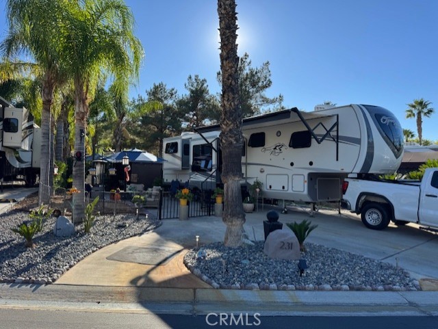 Such a cute lot right across from fishing pond and market. Gazebo makes for a perfect little hide-away to watch TV or read a book. This lot has multiple entertaining spots, Fire-table sitting area, BBQ cooking area zen-like garden area and a perfect 10x10 gazebo to chill in. Behind this lot is wide open grassy knoll with lots of trees to walk your dog or play a little bag toss. Rancho California RV Resort provides amenities such as a 14 hole Executive PAR 3 Golf Course (no fees for owners), 5 Pools/Jacuzzis, Tennis courts, Pickleball courts, Dog park, Club house, hiking trails, Horseshoe lawn, onsite grocery market and restaurant. The resort is guard gated with no age restrictions. Monthly HOA fee includes "unlimited" use of the golf course, amenities, trash pickup at lot, water/sewer and common area maintenance. Financing is available!