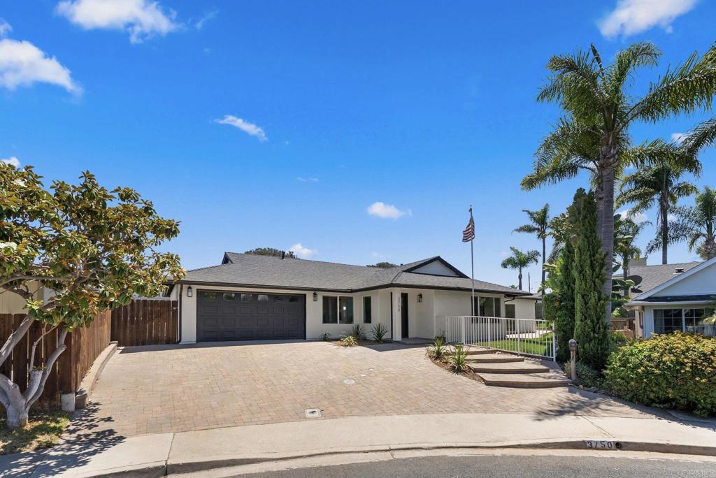 Dwell West proudly presents a designer-curated haven that seamlessly blends modern elegance with the timeless charm of Olde Carlsbad—just moments from the coast, yet a world apart. Tucked away at the end of a peaceful cul-de-sac, this beautifully reimagined single-level residence offers the perfect balance of style, comfort, and location in one of North County’s most sought-after neighborhoods. Thoughtfully redesigned with high-end finishes and functional upgrades, the home features 4 bedrooms, 3 bathrooms, and a dedicated office. The heart of the home is its bright, open-concept living, dining, and kitchen area, where natural light pours in through new sliding glass doors. The chef’s kitchen showcases crisp white shaker cabinetry, a dramatic waterfall quartz island, modern hardware, and an effortless connection to the main living spaces—perfect for entertaining. Enjoy the rare convenience of two spacious primary suites—each with its own luxurious ensuite—alongside two additional bedrooms and a flexible office space, ideal for working remotely or hosting guests. All three bathrooms feature stylish designer tilework, giving the home a cohesive and elevated feel. Additional upgrades include a new central A/C system, upgraded electrical subpanel, drought-tolerant landscaping, a custom craftsman-style front door, epoxy-coated garage floor, and bonus laundry cabinetry. Step outside to a generous backyard with endless potential—whether you envision a sparkling pool, lush garden, or tranquil outdoor lounge. All this with no HOA, and just minutes to the beach, Carlsbad Lagoon, and the vibrant shops, dining, and energy of downtown Carlsbad.