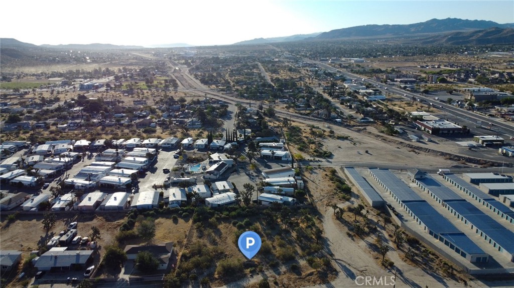 Prime commercial land for sale: 1 acre zoned CG (General Commercial) on Scarvan Road, just off Twentynine Palms Highway in downtown Yucca Valley. This location could be ideal for a convenience store or pharmacy, being directly adjacent to the Apache Senior Mobile Home Park. There are many residential homes in this area even though it's zoned for commercial use so check with the city to see if this would be allowed. The highly traveled Twentynine Palms Highway connects visitors to Joshua Tree, 29 Palms, Morongo Valley, Desert Hot Springs, and Palm Springs, offering excellent visibility and accessibility. This is a perfect opportunity to develop in a thriving community. Drive by today and start planning your future development!
**This property does not have an address assigned. "771 Scarvan Rd" is for listing purposes only.
APN# 0595-331-34-0000
Coordinates: 34.122794 / -116.437898