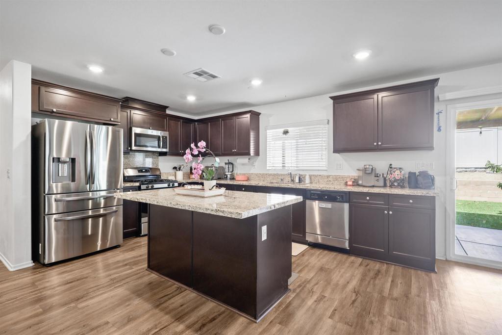 Welcome home to 10459 Nighthawk Ct. Beautiful home in a gated community and private street. Open floor plan design and private yard.