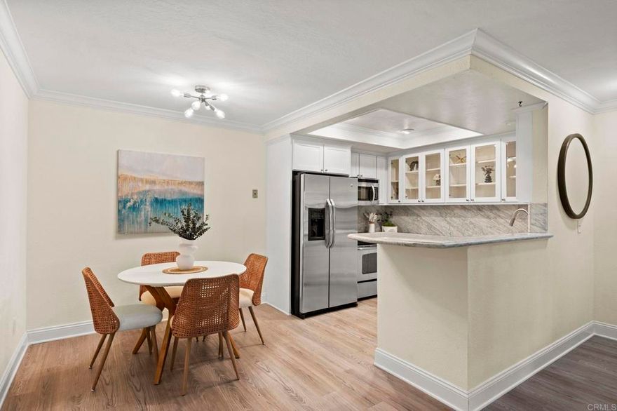 Discover the perfect home for first-time buyers or those looking to right-size at 6006 Rancho Mission Rd, San Diego, CA 92108. This charming 604-square-foot, 1-bedroom, 1-bathroom first-floor condo is nestled in the heart of Mission Valley, offering unmatched convenience and a vibrant lifestyle. Minutes from the Trolley, Snapdragon Stadium, 24-Hour Fitness, Fashion and Mission Valley malls, and the historic San Diego Mission, it's surrounded by diverse restaurants, entertainment, and shopping. Enjoy proximity to SDSU, Mission Trails hiking, Lake Murray, and beautiful beaches just 15 minutes away, with seamless freeway access. Inside, modern elegance shines with luxury wood-like flooring flowing through the living room, kitchen, and bedroom, plus sleek tile in the bathroom. Plantation-style shutters add style and insulation for year-round comfort. The updated kitchen boasts shaker cabinetry with glass accents, quartz countertops, a chic backsplash, and stainless-steel appliances including a stove, refrigerator, and dishwasher. The bright primary bedroom features a large wardrobe closet with mirrored doors, and a welcoming vibe. The hallway bathroom includes a dual vanity, large marble tile, and an oversized step-in shower with a seat, safety bars, and adjustable shower fixtures. Step out to your private covered patio with storage, ideal for morning coffee or evening nightcaps. This VA-approved complex offers resort-style perks: two pools, two spas, fitness center, tennis courts, BBQ areas, clubhouse, and laundry room. Includes one reserved parking spot and guest parking. Blending modern comforts, thoughtful upgrades, and an amenity-rich community, this condo is an exceptional opportunity in a highly sought-after San Diego location. Ideal for convenience, style, and vibrant living!