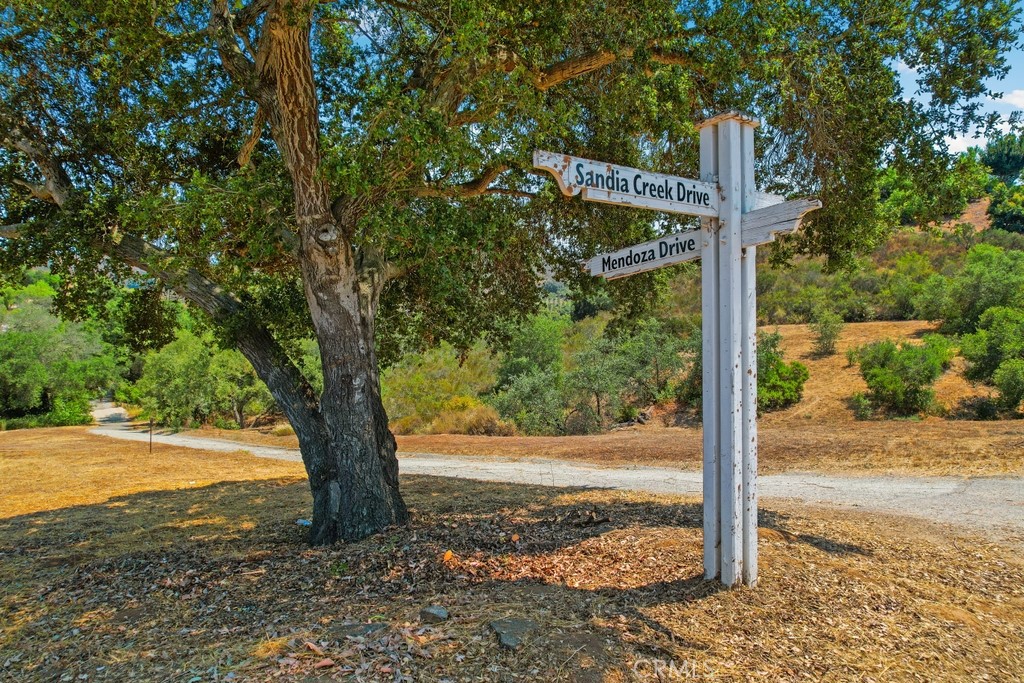 Stunning DeLuz Property – Approximately 12 minutes from Old Town Temecula! Discover the perfect blend of natural beauty and convenience with this exceptional property, located only 6.5 miles from the heart of Old Town Temecula, Interstate 15 and major shopping centers. This scenic corner lot offers two potential building sites, providing flexibility to design your dream home, guest house, or possible ADU. A year round stream meanders through the property, shaded by majestic mature oak trees, adding a peaceful, park-like setting. With a gentle topography, this land is ideal for building while still preserving its natural charm. A 1” water meter is already installed, and percolation tests are complete, saving you both time and money in the development process. Nestled on a paved, easily accessible road, this parcel offers both privacy and accessibility. Enjoy the serenity of country living while being just a short drive to Temecula’s award-winning wineries, charming Old Town, dining, entertainment, and top-rated schools. Don’t miss this rare opportunity to own a slice of paradise in one of Southern California’s most sought-after communities!