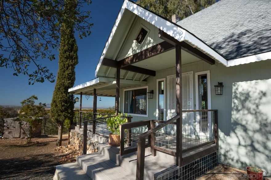 Experience the best of country living with all the modern comforts in this beautifully updated 2-bedroom, 2-bath home, perfectly perched on 5 usable acres overlooking the iconic Sutter Buttes. From sunrise to sunset, the views here are simply unforgettable.  The home blends rustic charm with tasteful updates, offering an inviting atmosphere filled with natural light and warmth. Enjoy peaceful mornings on the porch, cozy evenings under endless stars, and the kind of quiet you can’t find in town.  For those who love the outdoors, this property is a dream come true. A 2-stall barn with hay storage is ready for horses or livestock, while the 2-car outbuilding with power and workshop space is perfect for all hobbies, car enthusiasts, or anyone needing extra storage. You’ll also find a fully enclosed garden area and a dedicated chicken run, perfect for anyone looking to embrace a self-sustaining lifestyle. Grow your own produce, gather fresh eggs, and enjoy true farm-to-table living at your fingertips. Plus, partial RV hookups (power and water) make it easy to host friends or enjoy weekend getaways right at home.  All of this tranquility comes with the convenience of being just 30 minutes from town, giving you the perfect balance of peace and accessibility. Whether you’re seeking a private retreat, a small ranch, or a country escape with endless potential, this property delivers it all and more.