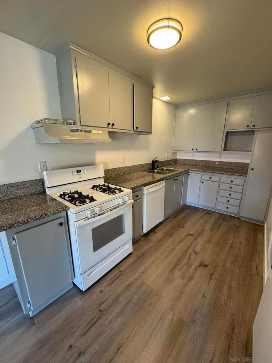 Bright & Cozy 2-Bedroom Apartment $2,100/Month  Step into this freshly updated, bright, and welcoming 2-bedroom, 1-bath apartment that offers comfort, convenience, and a peaceful place to call home. Tucked inside a quiet, well-maintained community, this unit is perfect for anyone looking for simple, easygoing living in a great El Cajon location.   Open and airy 900 sq. ft. layout with newer flooring and fresh designer paint Beautiful kitchen featuring granite countertops, modern cabinets, stove, dishwasher & refrigerator Updated bathroom with newer fixtures, countertop & toilet Comfortable living room with a cozy fireplace + built-in A/C unit Two inviting bedrooms, each with their own A/C unit, window coverings & closet space (primary has a walk-in) Convenient hallway storage closet with shelving Private front walkway surrounded by greenery perfect for your morning coffee or evening wind-down  2 assigned parking space On-site community laundry room with shared washer & dryer Security cameras throughout the property for added peace of mind. Tenant responsible for utilities  This home is clean, comfortable, and easy to maintain offering all the essentials for relaxed, modern living. Close to shopping, dining, and quick freeway access, it's a convenient spot to settle into and enjoy.   $2,100/month | 1-Year Lease or More