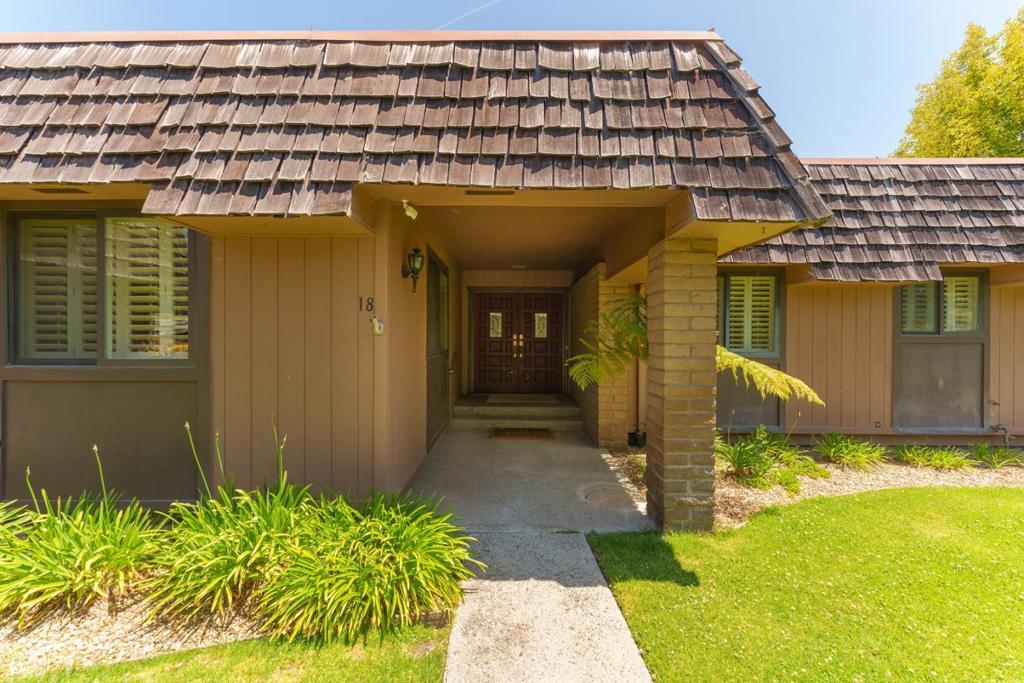 Quite simply, this is one of, if not the best, units in The Villas of Corral de Tierra. Tucked away in a private corner of the gated subdivision, and just above the 3rd green of the community golf course, this single level unit enjoys the serene nature and premium location surrounded by trees and hillsides. Inside you will find a fully remodeled kitchen with upgraded cabinets and granite counters, a spacious yet cozy living room with fireplace and wet bar as you take in the views of the outdoor patio and your private corner of the property. Two large bedrooms and a 3rd bonus room that is ideal as a separate family room, hobby room or home office, two very nice bathrooms, plus an indoor laundry room, provides plenty of space for living the relaxing lifestyle that Corral de Tierra has to offer. The community features amazing amenities including a private 10-hole par-3 golf course, putting green, large swimming pool and hot tub, tennis/pickle ball court, basketball court, billiards room and fishing pond. All of this in the heart of the Highway 68 sunbelt.