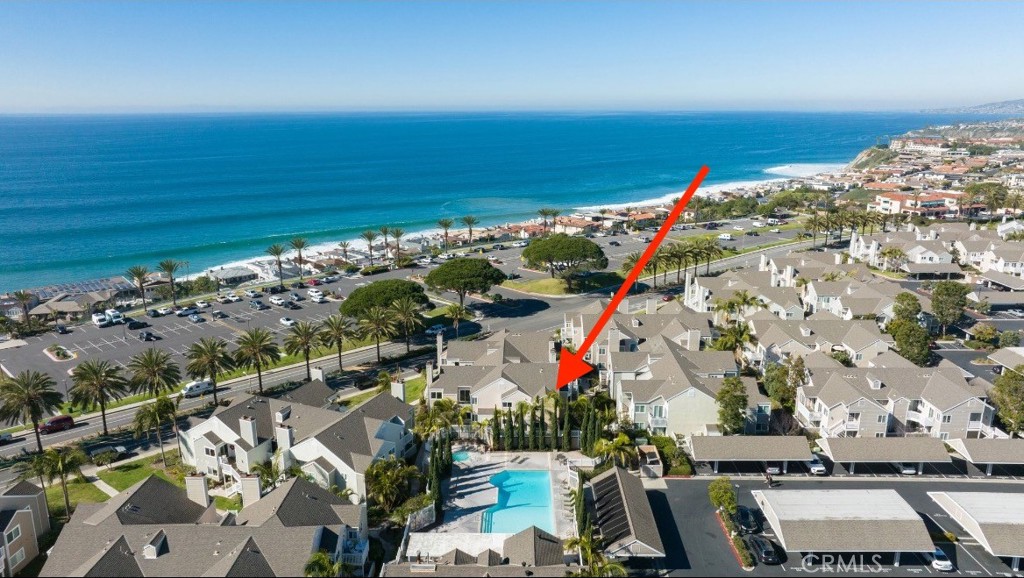 Available to rent September 1st 2025 - Perched on the cliffs of Dana Point’s sought-after Strands Beach, this stunning beachfront residence offers a thoughtfully designed single-level layout encompassing 1,235 square feet. Featuring three beautifully appointed bedrooms—each with new beds, TVs, and coastal-inspired décor—and two remodeled bathrooms, every detail has been carefully updated for modern beachside living. A serene color palette complements the brand-new kitchen, which boasts sleek cabinets, quartz countertops, and stainless-steel appliances. Throughout the home, luxurious vinyl plank flooring is paired with fresh 6-inch baseboards and new interior doors. Recessed LED lighting adds a warm glow, while the bathrooms are outfitted with quartz-topped vanities, new toilets, and stylish fixtures. Additional upgrades include dual-pane windows, fresh interior paint, and two private patios perfect for relaxation. The home also features mirrored wardrobes, an in-unit laundry area with a new washer and dryer, two covered carport spaces, and generous guest parking. Just steps from the bluffs above Strands Beach, this exceptional home offers an ideal retreat for you and your guests to enjoy the beauty and charm of Dana Point.