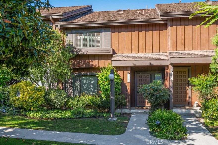 Welcome to this charming three-bedroom, two-and-a-half-bath townhome in the highly sought-after community of The Gardens. Freshly painted and move-in ready, this residence blends modern comfort with timeless appeal. The main level features beautiful luxury vinyl plank floors, enhancing the bright, open layout. The kitchen is thoughtfully appointed with clean white appliances, elegant Vetrazzo countertops, soft-close drawers, and a spacious pantry. A lovely bay window bathes the area in natural light, creating a warm and welcoming atmosphere. The adjacent dining room offers an ideal space for entertaining family and friends. Upstairs, you'll discover three generously sized bedrooms. The primary suite offers ample closet space, providing plenty of storage and comfort for daily living. Experience true year-round comfort, staying cool during summer with efficient A/C or Whole House Fan. Vinyl dual-pane windows throughout, along with upstairs double-hung windows, provide efficient ventilation and energy savings. Additional upgrades, including a tankless water heater and brand-new furnace (2024), contribute to lower utility bills and lasting peace of mind. For those perfect breezy days, simply open the front door and secure the HOA-approved screen door to invite a natural cross-breeze throughout your living space.

Step outside to a private patio oasis featuring a custom-made sunshade (chandelier included!), drip system with programmable timer for your favorite plants, and beautiful brick highlights—perfect for morning coffee or evening gatherings. The spacious 2-car garage, freshly painted for a clean look, includes large custom cabinets, ample storage for tools and seasonal items, a lengthy countertop for workspace, a deep sink for easy cleanup, and a dedicated clothes-drying area—making it as functional as it is versatile. Two additional highlights include a front view overlooking the largest greenbelt in the community, offering spaciousness and privacy, and convenient guest parking access at the back. Residents of The Gardens enjoy a sparkling pool and well-maintained tennis courts, all surrounded by lush, mature landscaping. In addition, The Gardens boasts a prime location near shopping, dining, and banking, with easy freeway access for seamless commutes and weekend getaways.