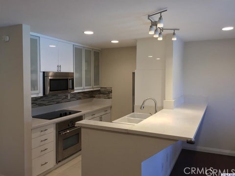 Photo of 898 Temple Terrace #124, Los Angeles, CA 90042 (MLS # GD26218735)