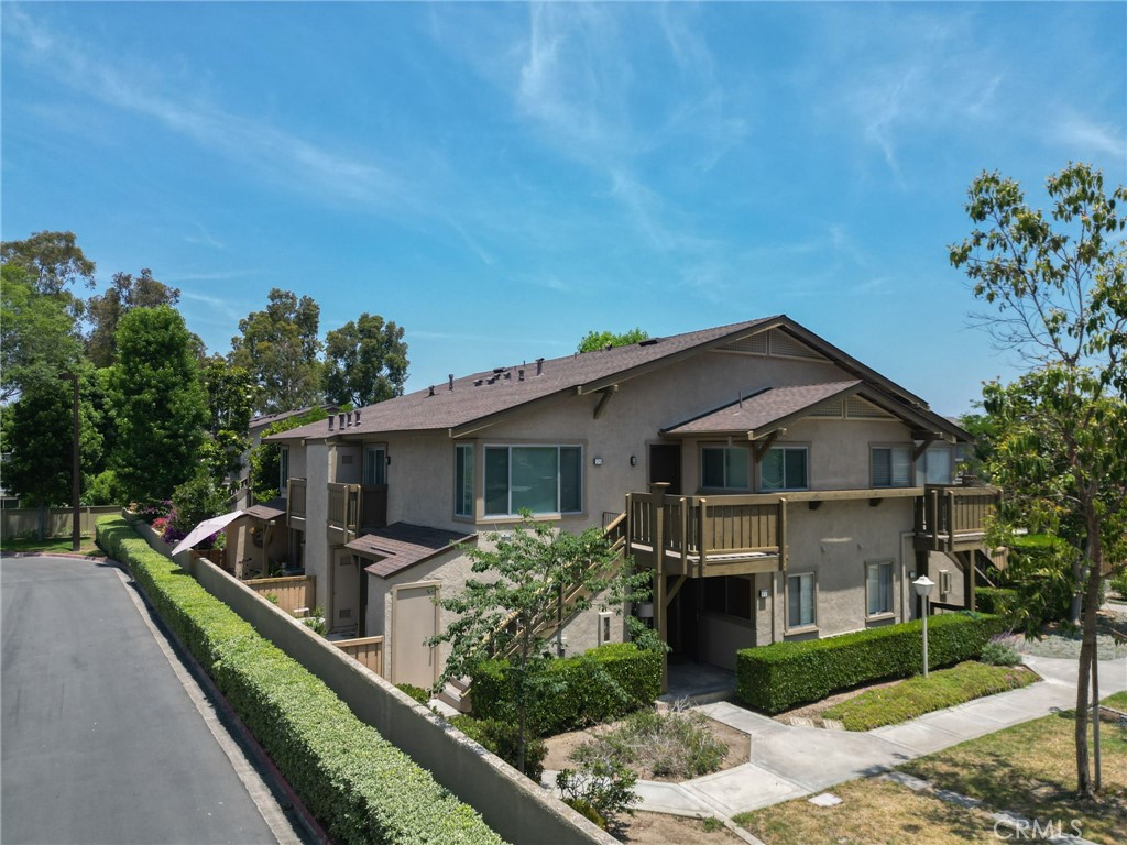 Welcome to this beautifully refreshed ground-floor end unit nestled in the highly sought-after Woodbridge community—an inviting neighborhood known for its tree-lined greenbelts and resort-style amenities.This light-filled home has been thoughtfully upgraded to blend comfort and style. Enjoy fresh interior paint throughout, brand-new flooring in the bedroom, hallway, and laundry area, with a modernized bathroom featuring a new vanity and toilet. The seamless open floor plan connects the living, dining, and kitchen spaces, all enhanced by expansive windows that flood the home with natural light and create a bright, airy atmosphere.Step outside to your own spacious private patio, ideal for relaxing or entertaining. A full-size laundry closet along with a separate bonus storage area, adds extra convenience and practical space.Tucked away in a tranquil setting this home has so much to offer. With immediate access to Woodbridge’s renowned amenities—sparkling lakes, sandy lagoons, pools, tennis and pickleball courts, basketball courts, playgrounds, parks, and scenic walking paths. All this, plus close proximity to top-rated schools, shopping, dining, and major freeways for an easy commute t John Wayne Airpoort, Laguna Beach, The Irvine Spectrum and UCI. Don’t miss this rare opportunity to own a charming, move-in-ready home in one of Irvine’s most beloved communities.