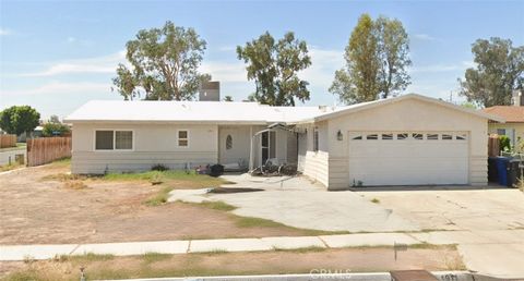 Photo of 1911 Smoketree Dr, El Centro, CA 92243 (MLS # DW26046536)