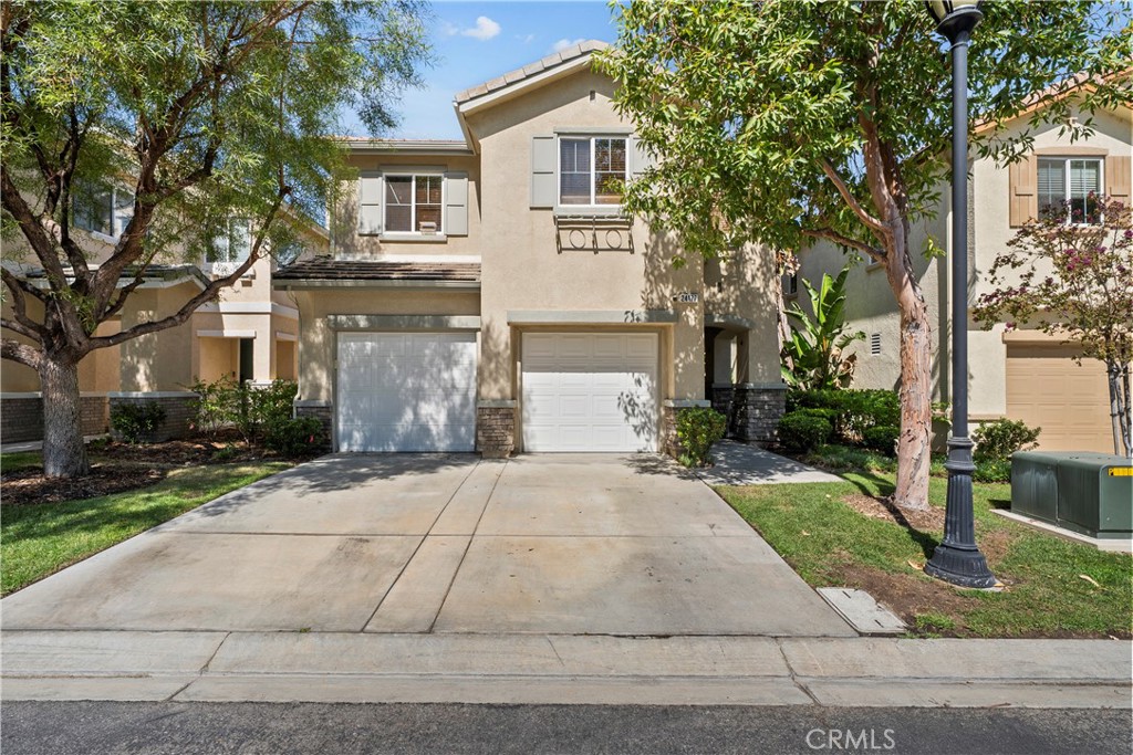 Welcome home to 24177 Tango Dr. Valencia, CA 91354! Located in the highly sought after Tesoro De Valle neighborhood, this spacious 4 bedroom, 2.5 bath homes offers 2,312 sq. ft. of living space making it one of the largest floor plans in the Tango tract. A rare financing opportunity to take advantage of a VA assumable loan at 2.625%. Step inside to find a bright and inviting main level featuring a well appointed kitchen with ample cabinetry, tiled counters, and modern stainless-steel appliances. The kitchen opens seamlessly to both the family room and dining area, creating a comfortable flow for everyday living and entertaining. A spacious living room provides additional flexibility, perfect for gatherings or a quiet retreat. Upstairs you’ll find all four bedrooms along with a den and laundry room for convenience. The primary suite offers a comfortable retreat with abundant natural light and generous closet space, while two full bathrooms complete the upper level. Enjoy the Southern California lifestyle in the private backyard featuring a covered patio, ideal for outdoor dining and entertaining. Additional highlights include a two-car garage and owned solar panels for energy efficiency, car charging in the garage, water softener, whole house water filtration system, and tankless water heater. Living in Tesoro De Valle means resort-style amenities right at your fingertips pools, spa, clubhouse, fitness center, tennis courts, and scenic walking trails. Conveniently located near award-winning schools, shopping, dining, and commuter access, this home blends space, comfort, and lifestyle. Don’t miss your chance to own one of the best floor plans in this desirable community! Schedule your showing today!