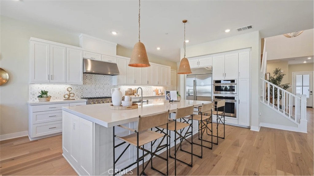 Welcome to Amora, an exclusive new luxury single-family home community nestled in the heart of Hacienda Heights. This expansive two-story home offers 5 spacious bedrooms, 5.5 designer bathrooms, a private home office, versatile bonus room, and a generous 3-car garage with built-in storage – ideal for modern living and entertaining. Crafted with exceptional attention to detail, this home combines elegance and functionality with open-concept living spaces, soaring ceilings, and premium finishes throughout. The chef-inspired kitchen flows seamlessly into the great room, perfect for gatherings and everyday comfort. Located near top-rated schools, scenic parks, and convenient freeway access, Amora delivers an elevated lifestyle in one of the San Gabriel Valley’s most sought-after neighborhoods.