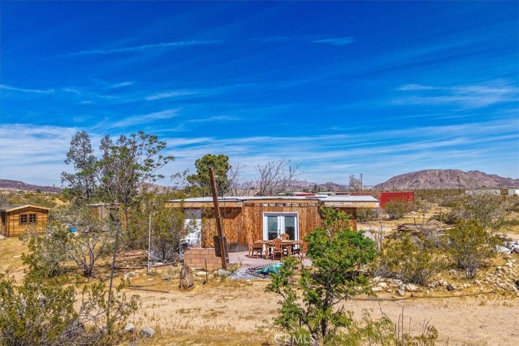 Photo of 1022 Chuckawalla Road, Landers, CA 92285 (MLS # JT26066683)