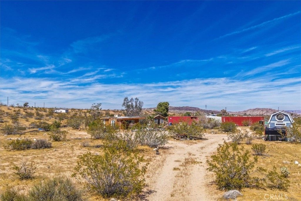 Photo of 1022 Chuckawalla Road, Landers, CA 92285 (MLS # JT26066683)