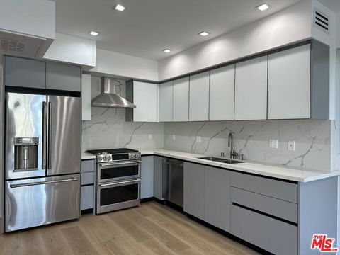 Photo of 9842 Vidor Drive Dr #101, Los Angeles, CA 90035 (MLS # 26840395)