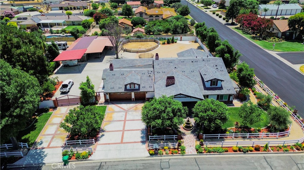 Welcome to 5525 Dover St, a fully renovated estate offering the perfect combination of space, comfort, and functionality. Sitting on an expansive 37,904 square foot lot, this property features a total of 6,209 square feet, including 4,460 square feet of permitted living space, a 747 square foot three-car garage, and an additional 1,002 square feet of enclosed patio and entry porch.
Step inside to find modern upgrades throughout, including recessed lighting, updated electrical, fire sprinklers, and a water softener system. The home has been structurally rebuilt from the ground up with permitted foundation and roofing work, including upgraded footing and plywood. It also features two septic tanks and an electric front gate for added privacy and security.
The main living space includes a built-in bar, perfect for entertaining guests or enjoying quiet evenings at home. The primary suite serves as your personal retreat, complete with a spa-style bathroom that features a jacuzzi tub and a steam room, just like those found in high-end gyms.
Outside, enjoy a 400 square foot enclosed patio, RV parking, and even a stable area ideal for horses or livestock. With alley access in the back, the layout provides extra convenience and flexibility for storage, parking, or future additions.
Whether you're looking for luxury, space, or something truly unique, this property checks every box.