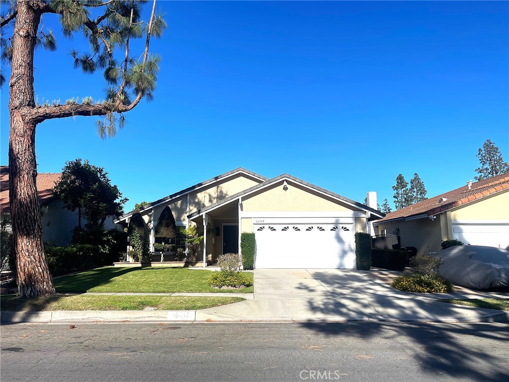 Location, location, location! Situated in the heart of the highly coveted ABC Unified School District, this beautiful and upgraded single-story home belongs to top-ranking schools—Gonsalves Elementary, Carmenita Middle, and Cerritos High School—and is also an excellent contender for the nationally acclaimed Whitney High School. Families will love the convenience of walking to Gonsalves Elementary, Carmenita Middle School, and the nearby Gonsalves Park for outdoor play and recreation. Step inside to a thoughtfully designed open floor plan where soaring vaulted ceilings with exposed beams create an airy sense of space. The inviting living room seamlessly connects with the kitchen and dining areas, making gatherings effortless and memorable. Gleaming laminate flooring flows gracefully throughout the home, enhancing its warm and welcoming feel. The bright gallery-style kitchen is beautifully upgraded with granite countertops, dark rich cabinetry, and the convenience of two Lazy Susan corner cabinets. The spacious primary suite impresses with its vaulted ceiling, adding volume and light, while both bathrooms have been stylishly upgraded with granite vanity counters, modern tile enclosures and flooring. Large sliding doors extend the living space outdoors to a tranquil backyard retreat. A large paved patio sits beneath a wide open patio cover, offering the perfect shaded setting to relax or entertain guests. The lush green lawn, thoughtfully designed built-in planters, and a variety of fruit trees create a private oasis for year-round enjoyment. Surrounded by all other conveniences, this home is also just minutes to Cerritos Town Center, Performing Arts Center, Civic Center, the spacious Cerritos Park East, and offers easy access to freeways 5 and 91—making commutes and weekend outings a breeze. Other appealing features: Central heat/AC, dual pane windows and sliding doors, direct access to 2 car garage. With its prime location, modern upgrades, and inviting indoor-outdoor flow, this home is the perfect blend of comfort, style, and convenience. Welcome to your new Home Sweet Home!