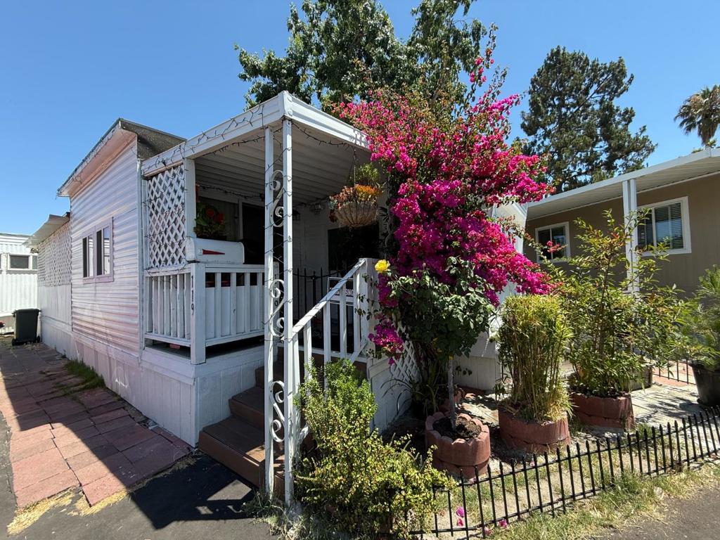 Discover this 1959 home located in the Arbor Point Community. This delightful property offers approximately 410 square feet of living space with 1 bedroom and 1 bathroom. Inside, the living room features a ceiling light and linoleum flooring. The kitchen is equipped with a tile backsplash, granite countertops, a stainless steel refrigerator, a gas stove and oven, a garbage disposal, a ceiling light, and linoleum flooring. The bedroom also has linoleum flooring. The bathroom includes a shower with a sliding glass door, linoleum flooring, and cabinets. The utility room comes with linoleum flooring, and a washer and dryer are included. Additional features of this home include wall-unit air conditioning and heating, a backyard with 1 shed, and convenient access to Freeways 101/680 and nearby shopping centers. Stop by today to see it for yourself!