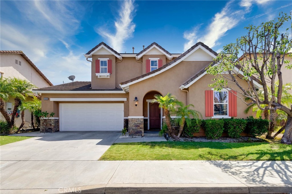 Welcome to your dream home in the highly sought-after Artisan community of Chino Hills! This beautifully remodeled 4-bedroom, 3-bathroom residence offers 2,515 sq ft of modern living, built in 2003 and thoughtfully upgraded throughout.
Step inside to discover brand new interior paint and luxury vinyl plank flooring flowing seamlessly across the open floor plan. The modern kitchen and all three bathrooms have been tastefully updated with premium finishes, complemented by stylish recessed lighting and elegant crown molding. One bedroom and full bathroom are conveniently located on the main level—perfect for guests or multi-generational living. Upstairs, the spacious loft provides the flexibility for fifth bedroom, home office, or entertainment area.
Enjoy peace of mind with updated 200A electrical panel, 3-car garage featuring epoxy flooring, and EV charging outlet. The front and back yards have been newly landscaped, creating inviting spaces for relaxation and gatherings. The private backyard offers serene valley and trail views—ideal for enjoying quiet mornings or entertaining friends.
Ideally located near top-rated schools like Michael G. Wickman Elementary and Chino Hills High, as well as scenic trails, parks, and popular dining spots, this home offers the perfect blend of comfort and convenience. Truly turn-key—just move in and enjoy all that vibrant Chino Hills has to offer. Don’t miss your chance to own this beautifully updated gem!