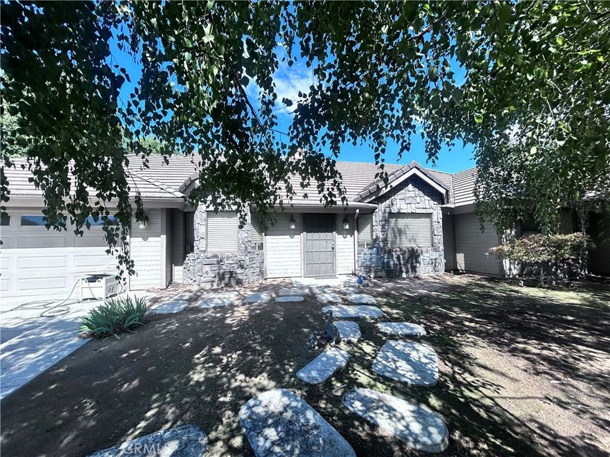 Welcome to this fantastic 4 bedroom and 3 bath home in one Yucaipa's desirable area. It welcomes you with beautiful overgrown trees all throughout the front yard providing a nice autumn feel. As you make your way inside the home you will notice the brand NEW carpet floor all through the open floor plan of the family room with fresh new paint, recess lighting, Skylights in the kitchen area, and high cathedral ceilings. You will also find a well kept and maintained kitchen with tile countertops, an island (so useful while cooking a family dinner or hosting a fathering with family and friends), and brown spacious cabinets. The best part about this kitchen its the breath taking view of the Wildwood Canyons from the sink area. Another great feature of this home is the grand master bedroom. It provides plenty of space with its own wood chimney, double closet and master bathroom. The master bathroom has the double sink, skylights, its independent shower and tub with the views of the trees. Down the hall you find the a full bathroom and two of the bedrooms with brand new carpet and paint. On the opposite side of the home you will the fourth bedroom, which could be use as office space or your own private library for entertainment. Right next to it, you will find the half bathroom to use for guest. Along that hall you will see a door leading you to he attached 2 car garage and the attached laundry room with an exit door leading you to the backyard. Now, when you make your way back to the family room you will see a sliding door taking you to covered patio, spacious enough for family gatherings with nice big windows showing the views. As you continue to open the other set of sliding doors you will step into an open patio leading to a gorgeous backyard. Its spacious enough to host a family event or simple enjoy nature. Propane tank has been recently refilled.  It's only 20 mins away from the famous 123 Farm, close to hiking trails. Come see it now and make it your own.