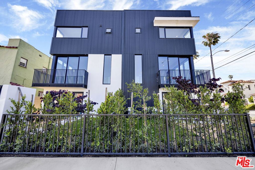 Last Home Available! Dream Home Lender Program Eligible- Contact for information. Experience elevated living in Faircrest Heights with these brand-new, architecturally stunning homes. Each residence features 2 main bedrooms on the top floor & 1 flex/office/guest room on the ground level-all ensuite, 3.5 luxurious bathrooms, and approximately 1,856 sq ft of thoughtfully designed space. Ideal for anyone who needs a home office. Enjoy the convenience of a private two-car garage with direct access, and indulge in designer finishes and curated details. Two homes offer larger front yards; the other two have smaller patio/yard areas- perfect for outdoor entertaining or serene relaxation. Soak in breathtaking panoramic views stretching from Downtown LA to Century City on the expansive rooftop decks. These homes are designed with style and sustainability, featuring a 2.05 kW solar system, drip irrigation, low-flow fixtures, a tankless water heater, a high-efficiency HVAC system, and LED lighting. All finishes are consistent throughout each home and feature white oak engineered hardwood floors, floor-to-ceiling pocket sliding doors, and 10'-4" ceilings in the living room. The gourmet kitchen has a large island, wine bar, custom cabinetry, cabinet-depth Bespoke refrigerator, Forno 6-burner chef's range with convection oven, drawer microwave, and dishwasher. These low-maintenance, no-HOA homes are ideally situated for easy access to Downtown LA and the Westside, offering the best of both worlds.